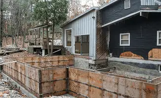 Prepared site with foundation forms for home remodeling and addition project in Bloomington, IN